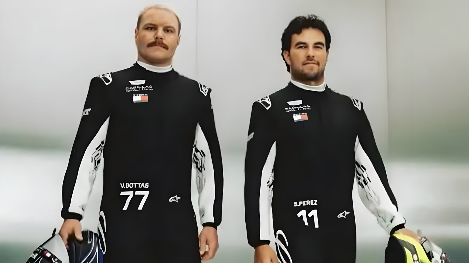 Cadillac Formula 1 Team: Consecutive Double Finishes Prove 2026 Maturity 1 Valtteri Bottas and Sergio Perez in black Cadillac Formula 1 Team race suits holding helmets during the 2026 inaugural season.