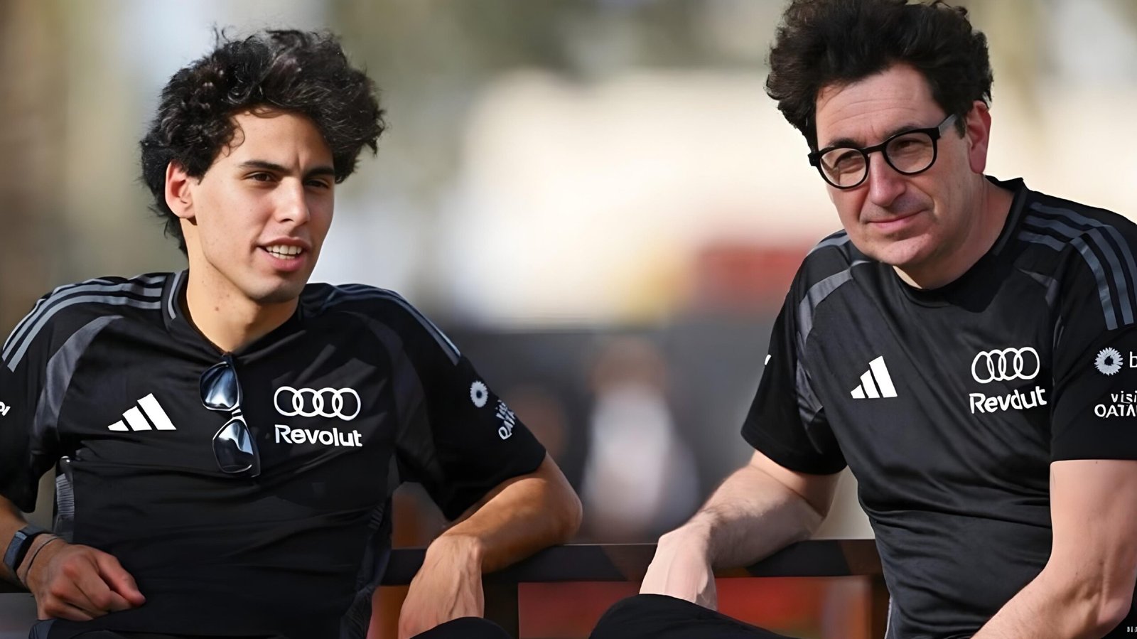 Mattia Binotto and Gabriel Bortoleto in Audi Revolut F1 gear at the 2026 Australian GP.