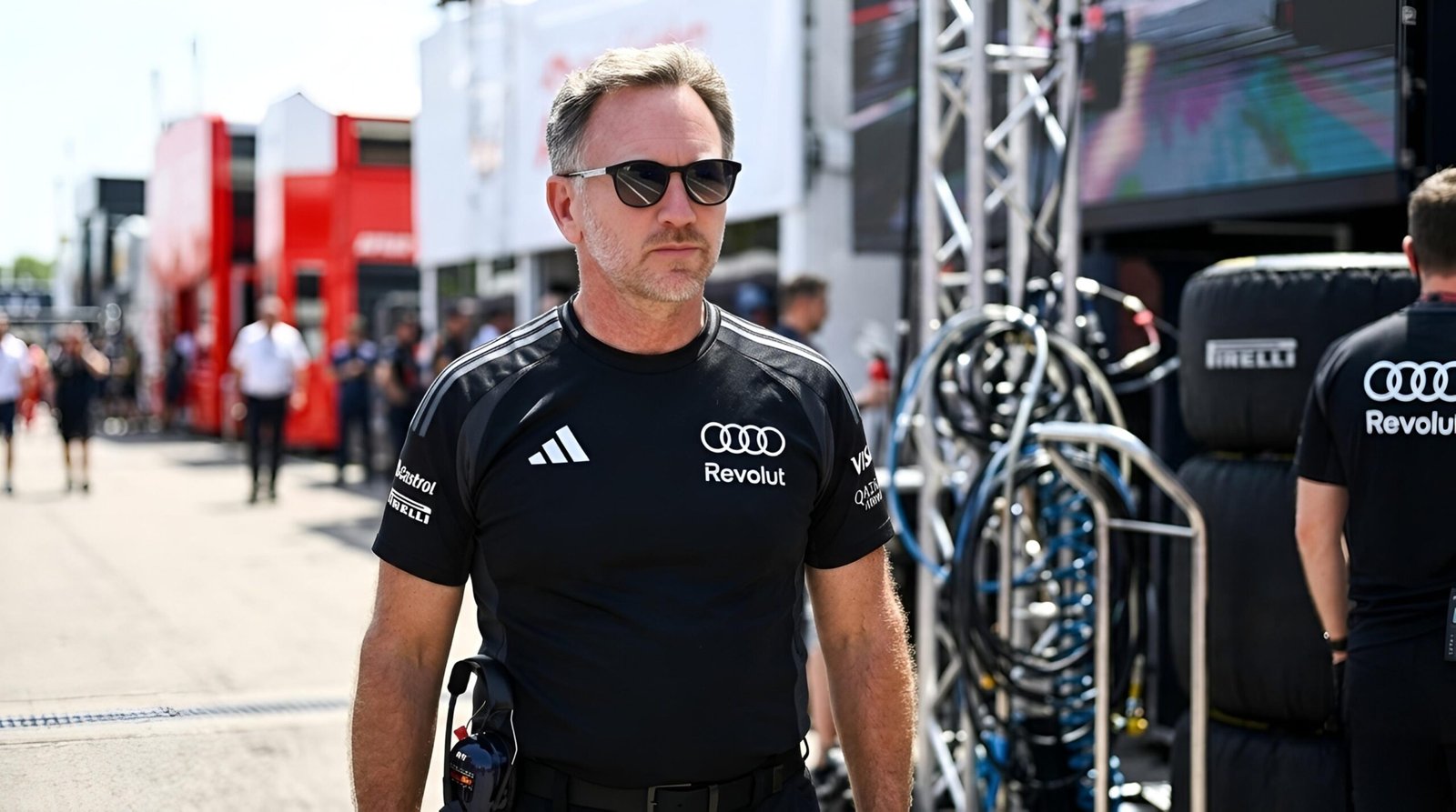 Christian Horner wearing Audi F1 team kit in the paddock after Jonathan Wheatley’s departure
