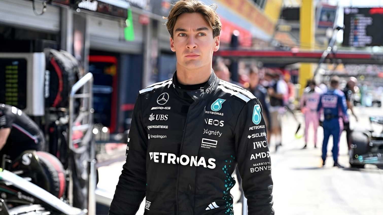 George Russell wearing Mercedes AMG Petronas F1 race suit in the pit lane during the 2026 Formula 1 season