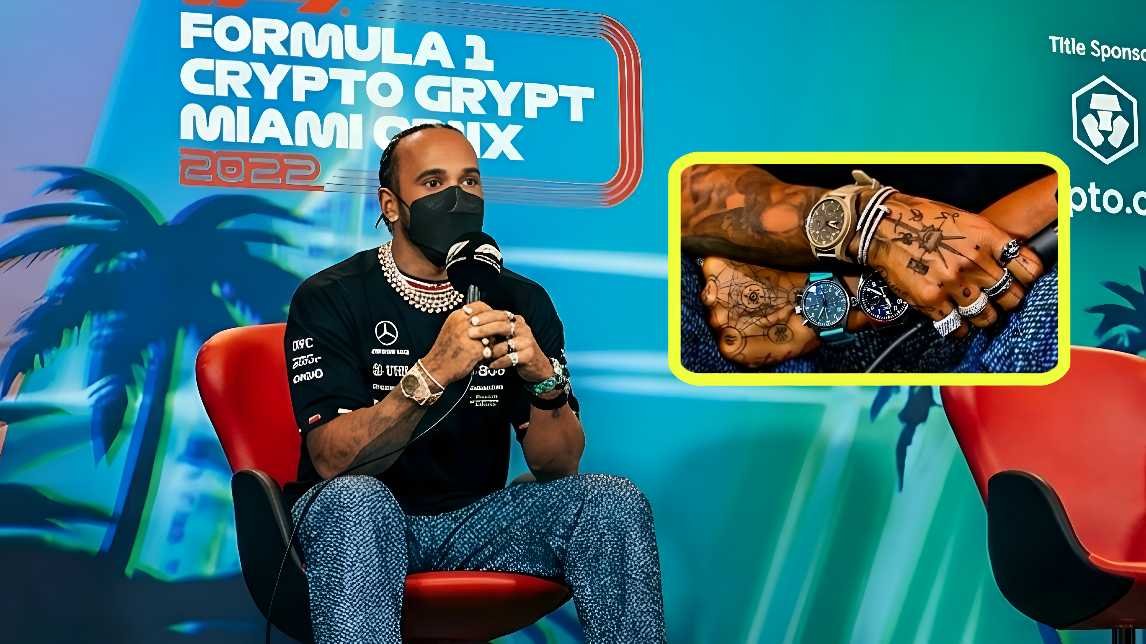 Lewis Hamilton wearing multiple watches, rings, and necklaces at the 2022 Formula 1 Miami Grand Prix press conference protesting the FIA jewelry ban